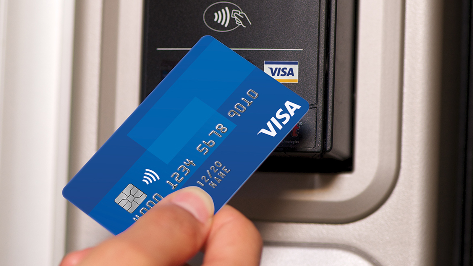Tapping Visa card  with Visa's contactless payments system.