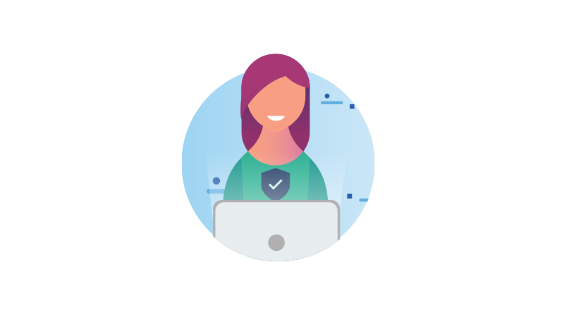 A smiling woman sitting at her laptop, using Visa's 3DS payment solution